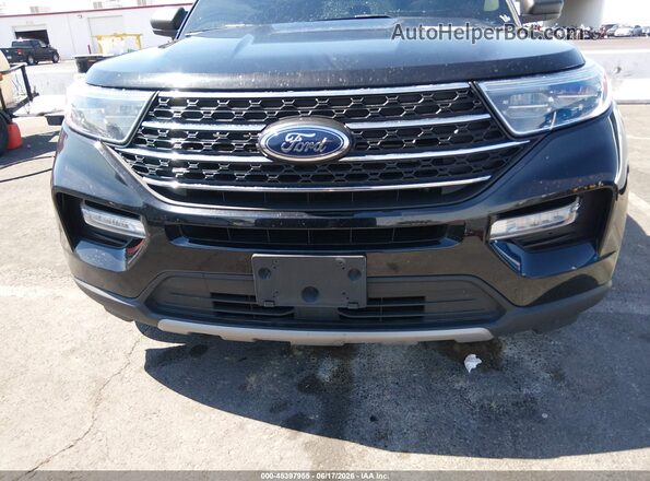 1FMSK7DH5RGA04198 2024 FORD EXPLORER Black Vista interior trasera