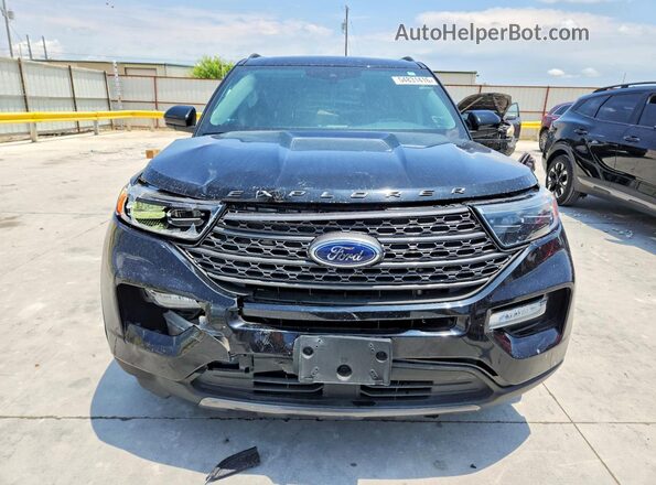 1FMSK7DH9NGC29637 2022 FORD EXPLORER Black Front view