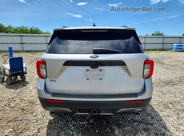 1FMSK7KH7NGA18391 2022 FORD EXPLORER Silver Vista trasera