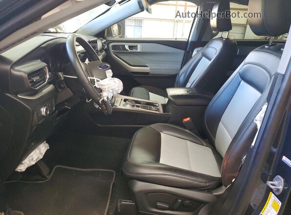 1FMSK8DH1NGA63040 2022 FORD EXPLORER Черный Вид салона спереди