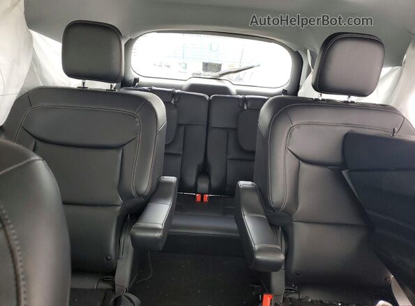 1FMSK8DH2PGB08960 2023 FORD EXPLORER Black Vista de los asientos traseros