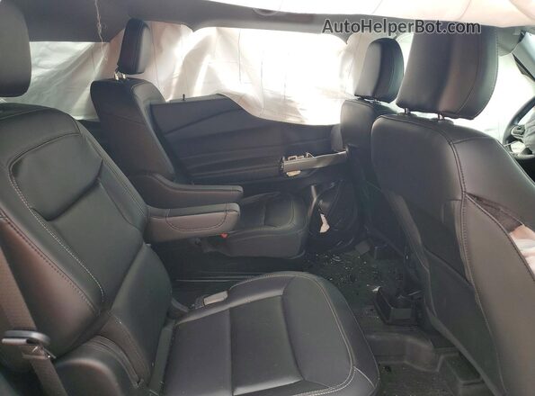1FMSK8DH2PGB08960 2023 FORD EXPLORER Black Vista interior trasera