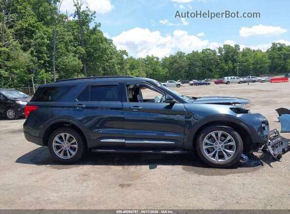 1FMSK8DH8RGA34527 2024 FORD EXPLORER Blue Vista interior trasera