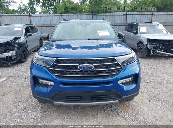 1FMSK8DH9MGC38441 2021 FORD EXPLORER Blue Vista interior trasera