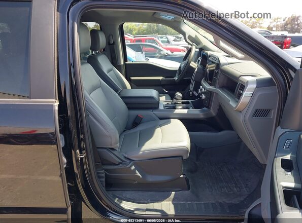 1FT6W1EV4PWG11241 2023 FORD F-150 LIGHTNING Черный Вид салона спереди