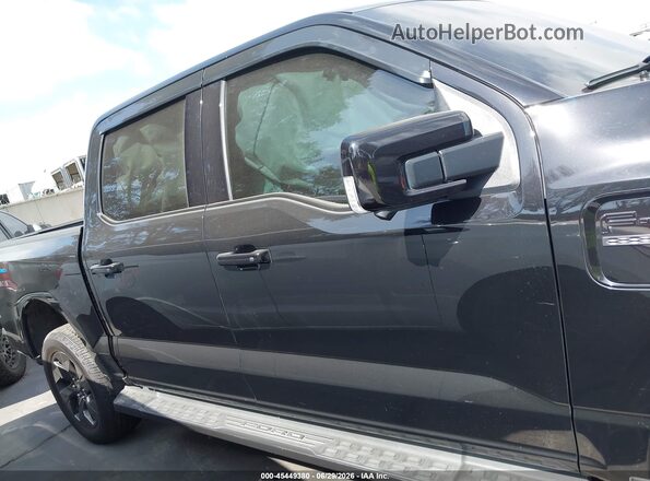 1FT6W1EV6PWG38330 2023 FORD F-150 LIGHTNING Black Սալոնի հետևի տեսք