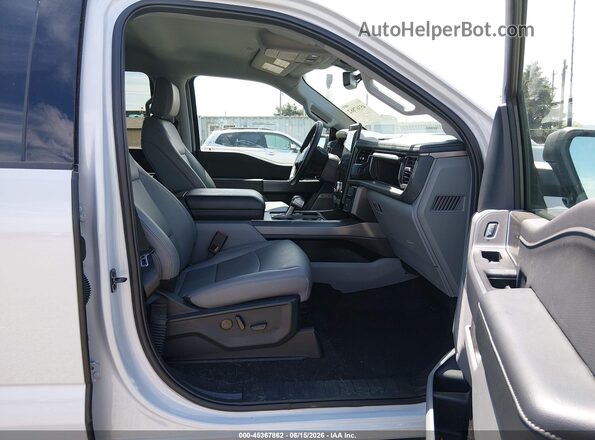 1FT6W3LU9SWG26543 2025 FORD F-150 LIGHTNING Light Blue Вид салона спереди