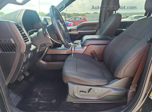 1FTEW1CP3GFC65697 2016 FORD F150 Black Widok wnętrza z przodu