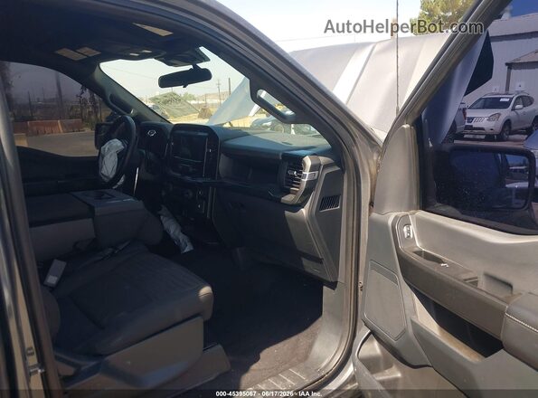 1FTEW1CP8PKD79413 2023 FORD F150 Gray Widok wnętrza z przodu