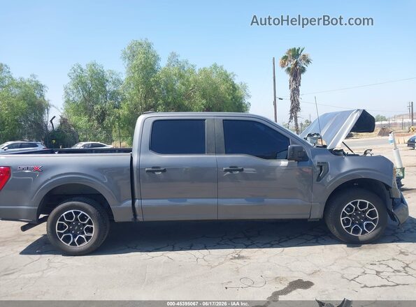 1FTEW1CP8PKD79413 2023 FORD F150 Gray Widok wnętrza z tyłu
