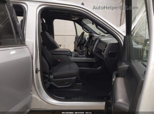1FTEW1E41KFA76851 2019 FORD F150 Серебряный Вид салона спереди