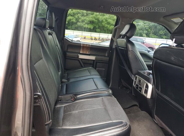 1FTEW1EG0JFD04735 2018 FORD F150 Black Vista de los asientos traseros