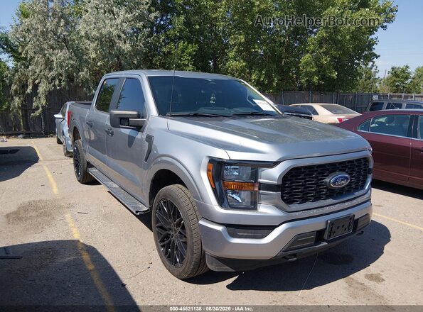 1FTEW1EP4PKF67424 2023 FORD F150 Gray Вид задньої частини салону