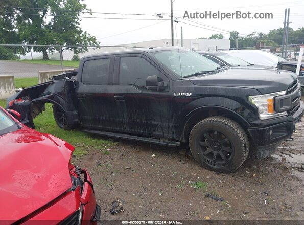 1FTEW1EP7JFC86198 2018 FORD F150 Black Widok wnętrza z tyłu