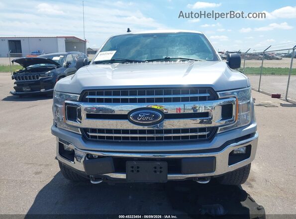 1FTEW1EP7LKF17675 2020 FORD F150 Silver Rear interior view