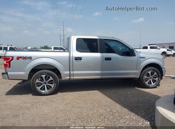 1FTEW1EP9KFB03319 2019 FORD F150 Silver Rear interior view