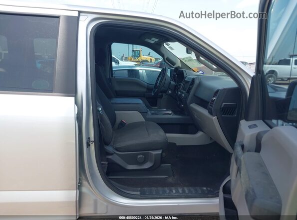 1FTEW1EP9KFB03319 2019 FORD F150 Silver Front interior view
