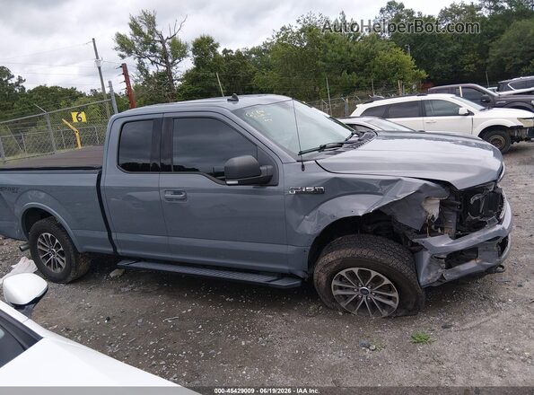1FTEX1EP0KKD43623 2019 FORD F150 Серый Вид задней части салона
