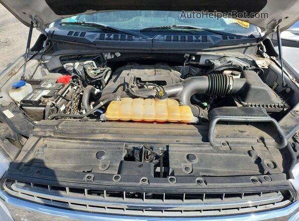 1FTEX1EP2JFA27129 2018 FORD F150 Silver Rear interior view