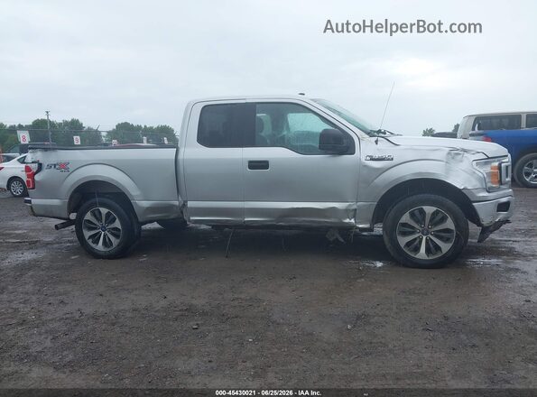 1FTEX1EP4KFB32112 2019 FORD F150 Silver Widok wnętrza z tyłu