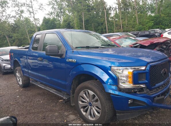 1FTEX1EP7JFC12289 2018 FORD F150 Blue Widok wnętrza z tyłu