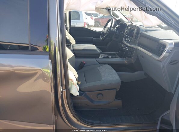 1FTFW1CD8PFC61073 2023 FORD F150 Gray Front interior view