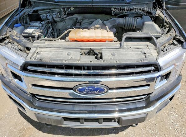1FTFW1E56JFD61752 2018 FORD F150 Black Vista interior trasera
