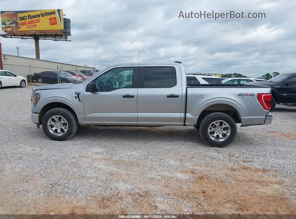 1FTFW1E82PFC49758 2023 FORD F150 Серебряный Вид задней части салона
