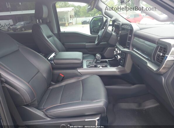 1FTFW1E85PFC81037 2023 FORD F150 Black Widok wnętrza z przodu