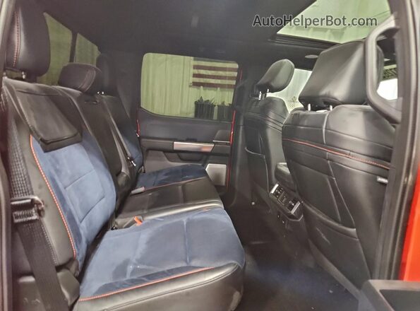 1FTFW1RG3PFC76484 2023 FORD F150 Orange Vista de los asientos traseros