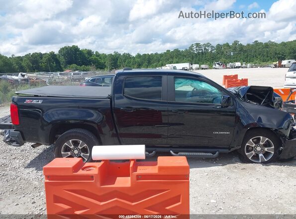 1GCGTDEN0H1148379 2017 CHEVROLET COLORADO Black Widok wnętrza z tyłu