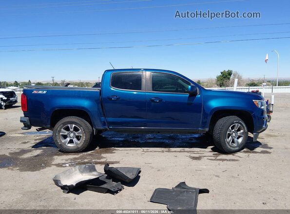 1GCGTDEN1K1127905 2019 CHEVROLET COLORADO Blue Widok wnętrza z tyłu