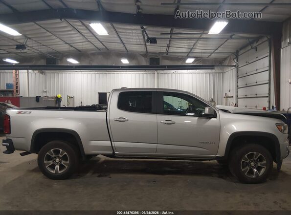 1GCGTDEN9J1173044 2018 CHEVROLET COLORADO Серебряный Вид задней части салона