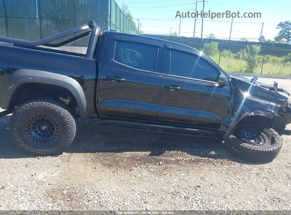 1GCPTFEK4S1159877 2025 CHEVROLET COLORADO Черный Вид задней части салона