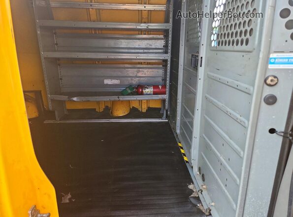1GCWGAFFXG1243715 2016 CHEVROLET EXPRESS Yellow Widok wnętrza z tyłu