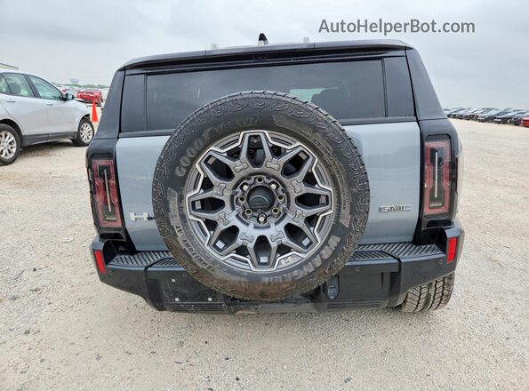 1GKB0RDC8RU113125 2024 GMC HUMMER Серый Вид сзади