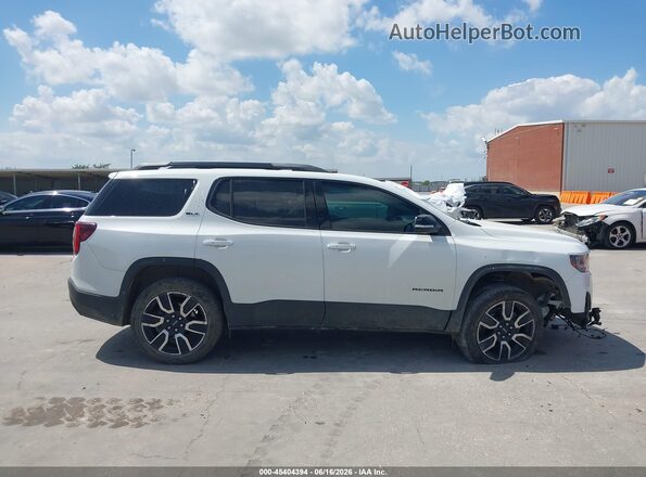 1GKKNML45MZ210695 2021 GMC ACADIA White Widok wnętrza z tyłu