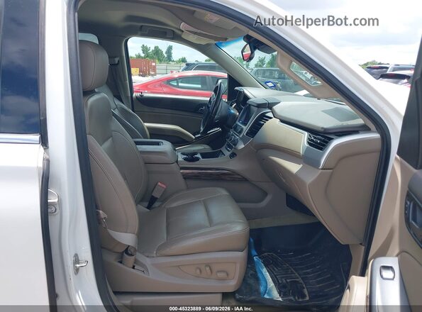 1GKS2GKC8GR444238 2016 GMC YUKON White Widok wnętrza z przodu