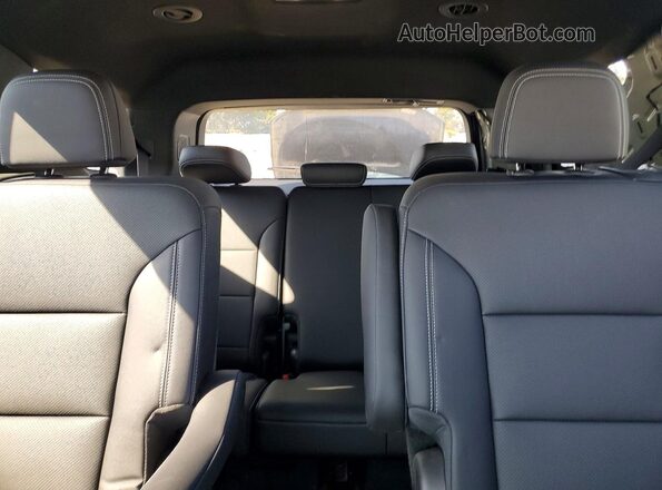 1GNERGRS1SJ267080 2025 CHEVROLET TRAVERSE Silver Rear seats view