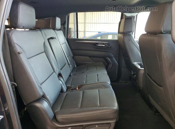 1GNS6DRD0SR339996 2025 CHEVROLET SUBURBAN Charcoal Вид задньої частини салону