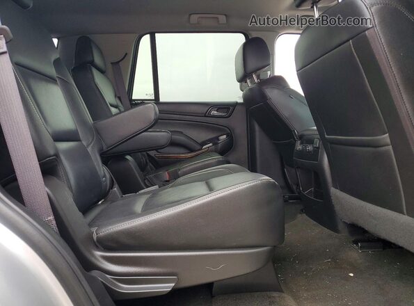 1GNSCBKC2HR336718 2017 CHEVROLET TAHOE Silver Widok wnętrza z tyłu