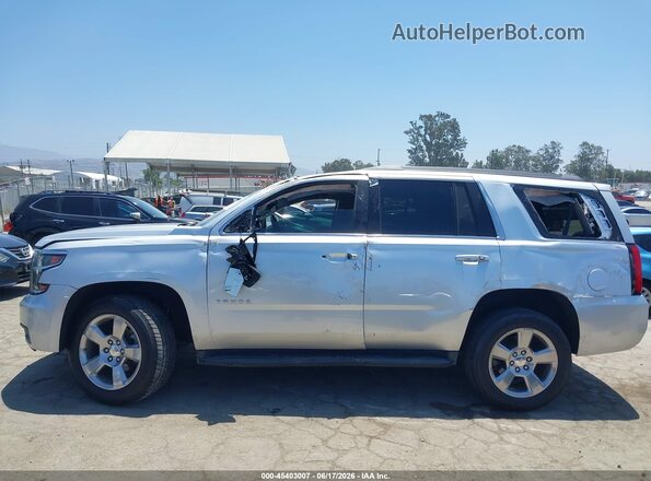 1GNSCBKC3JR403347 2018 CHEVROLET TAHOE Silver Widok wnętrza z tyłu