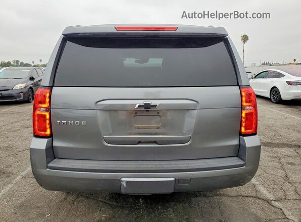 1GNSCBKC4JR347953 2018 CHEVROLET TAHOE Серый Вид сзади