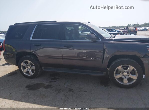 1GNSCBKC6GR327034 2016 CHEVROLET TAHOE Gray უკანა სალონის ხედი