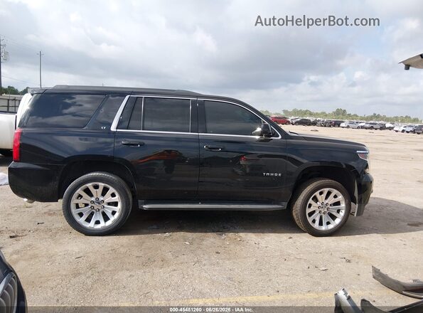 1GNSCBKC7HR211343 2017 CHEVROLET TAHOE Black Widok wnętrza z tyłu
