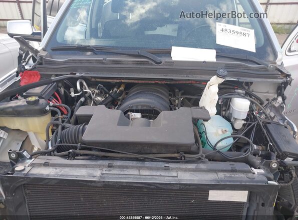 1GNSCBKC7KR409489 2019 CHEVROLET TAHOE Silver უკანა ხედი