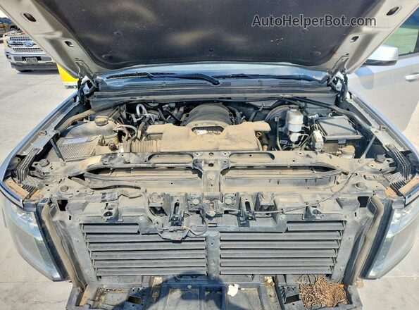 1GNSCBKC9KR284592 2019 CHEVROLET TAHOE Silver Շարժիչի բաժամունքի տեսք