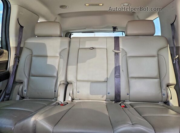 1GNSCBKC9KR284592 2019 CHEVROLET TAHOE Silver Հետևի նստատեղերի տեսք