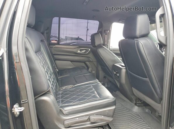 1GNSCBKDXPR109929 2023 CHEVROLET SUBURBAN Black Vista interior trasera