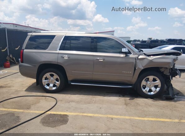 1GNSCCKC1JR397456 2018 CHEVROLET TAHOE Tan Widok wnętrza z tyłu